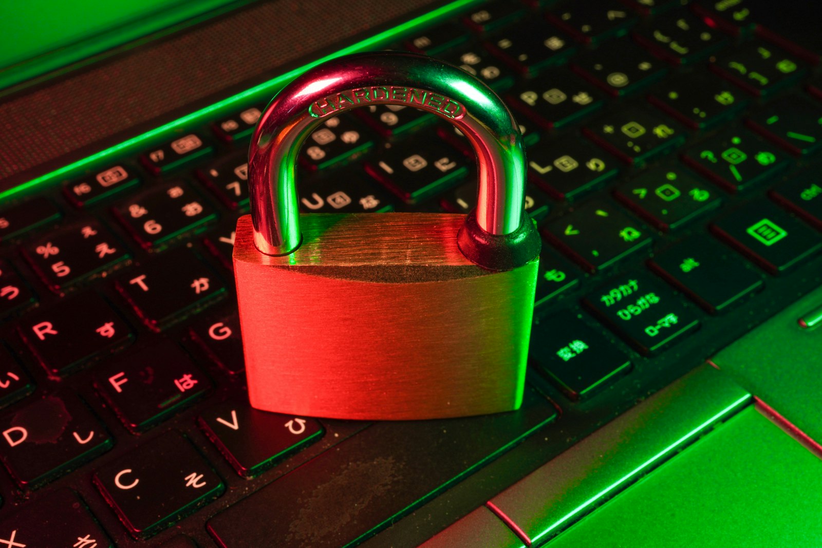 Padlock on a laptop keyboard representing cybersecurity protection